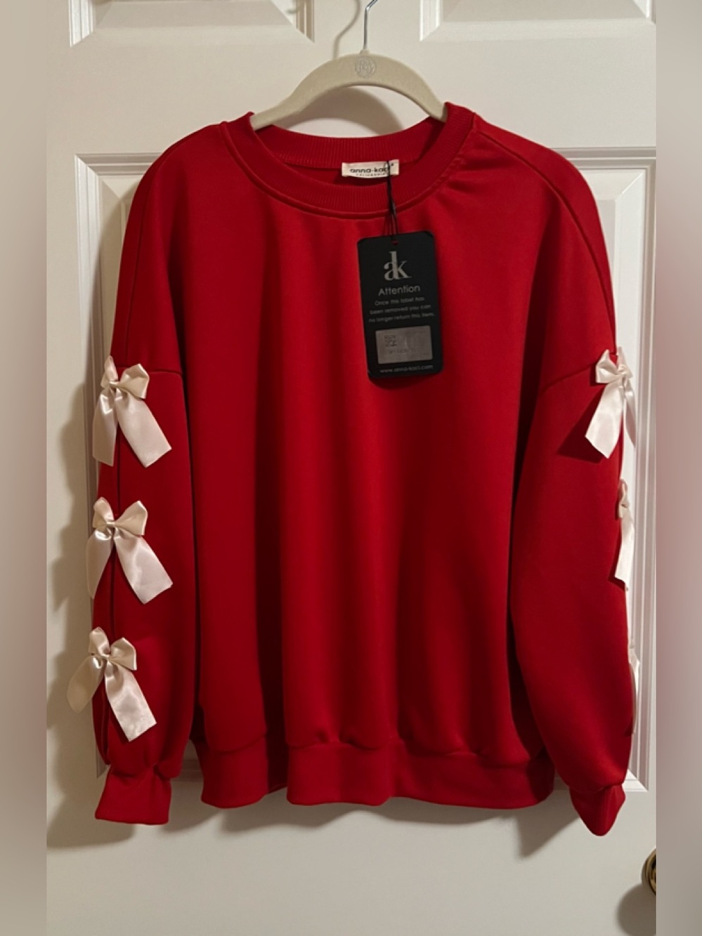 NWT anna-kaci red sweatshirt with bow detail. Size S
